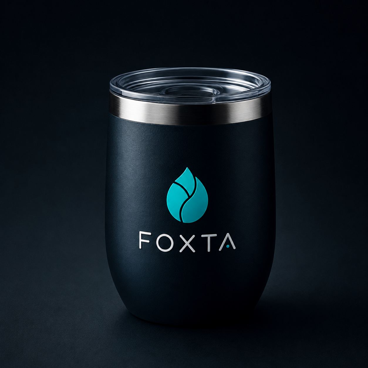 Vaso térmico negro con el logotipo de Foxta en blanco y la gota en turquesa